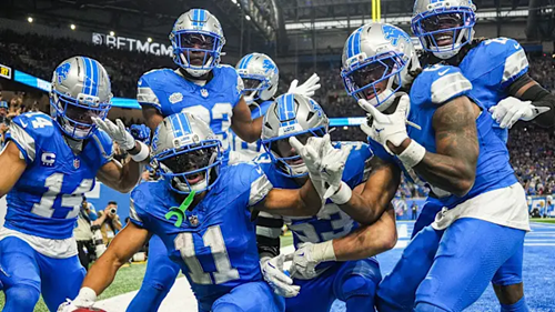Lions player celebrating after TD.
